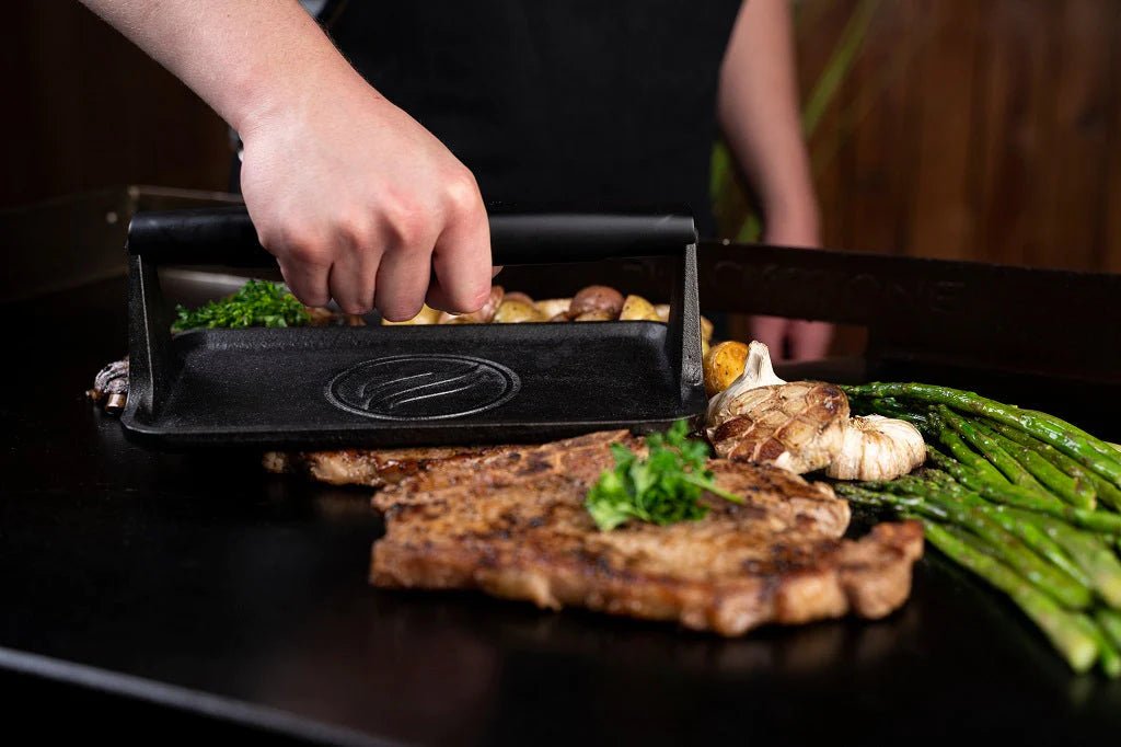 Blackstone Griddle Burgerpresse - grillstarshop.comBlackstone Griddle BurgerpresseGrillzubehörBlackstonegrillstarshop.com