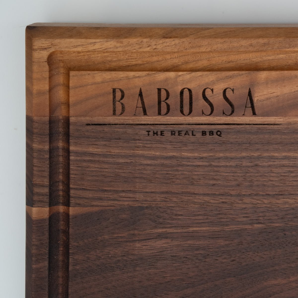 BABOSSA | Nussbaum Schneidebrett L | Naturkante | Saftrille | 44,5x35x4,5 cm - grillstarshop.comBABOSSA | Nussbaum Schneidebrett L | Naturkante | Saftrille | 44,5x35x4,5 cmHolzbrettBABOSSAgrillstarshop.com
