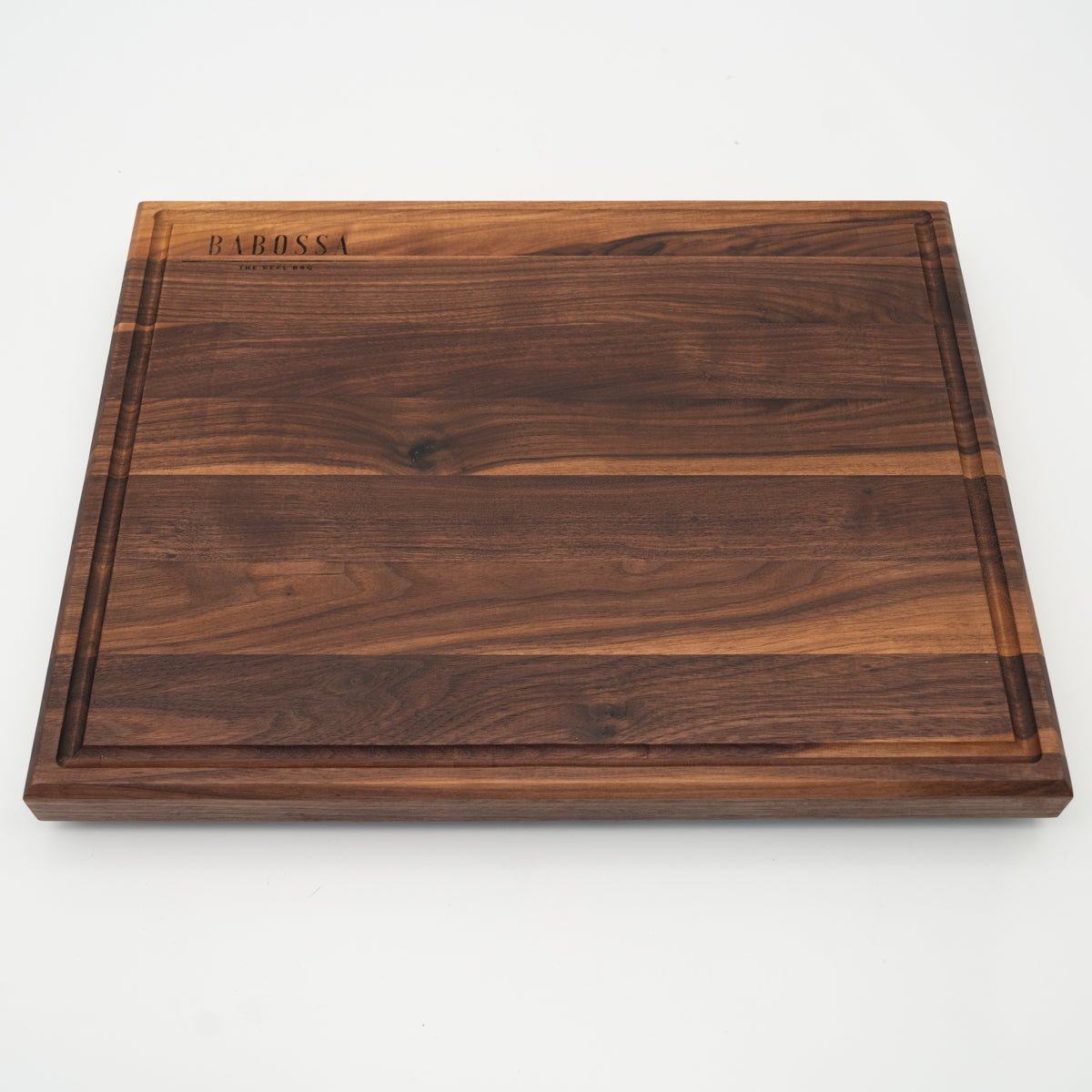 BABOSSA | Nussbaum Schneidebrett L | Naturkante | Saftrille | 44,5x35x4,5 cm - grillstarshop.comBABOSSA | Nussbaum Schneidebrett L | Naturkante | Saftrille | 44,5x35x4,5 cmHolzbrettBABOSSAgrillstarshop.com