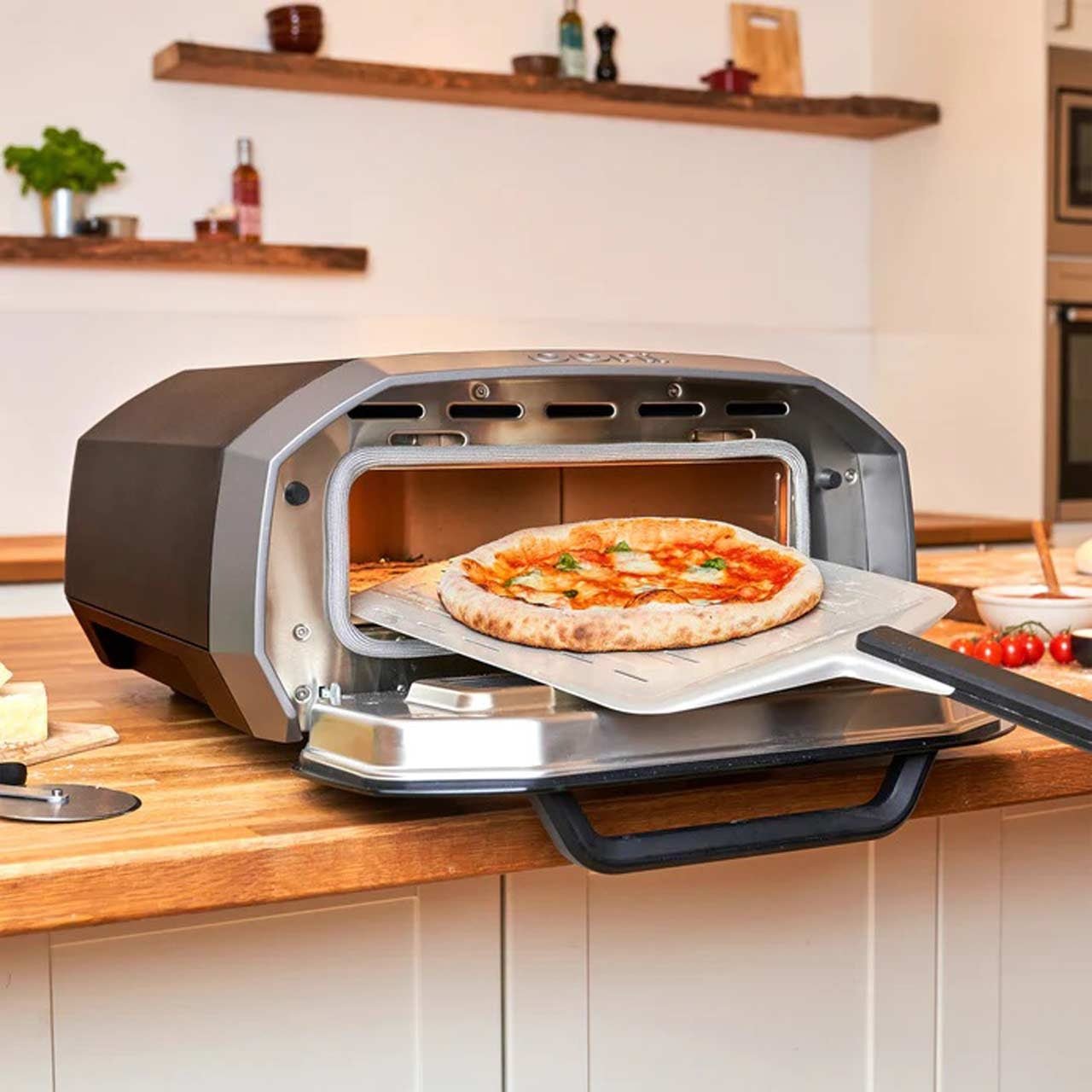 Ooni Volt 12, elektrischer Pizzaofen - grillstarshop.comOoni Volt 12, elektrischer PizzaofenOonigrillstarshop.comUU - P12B005060568346748