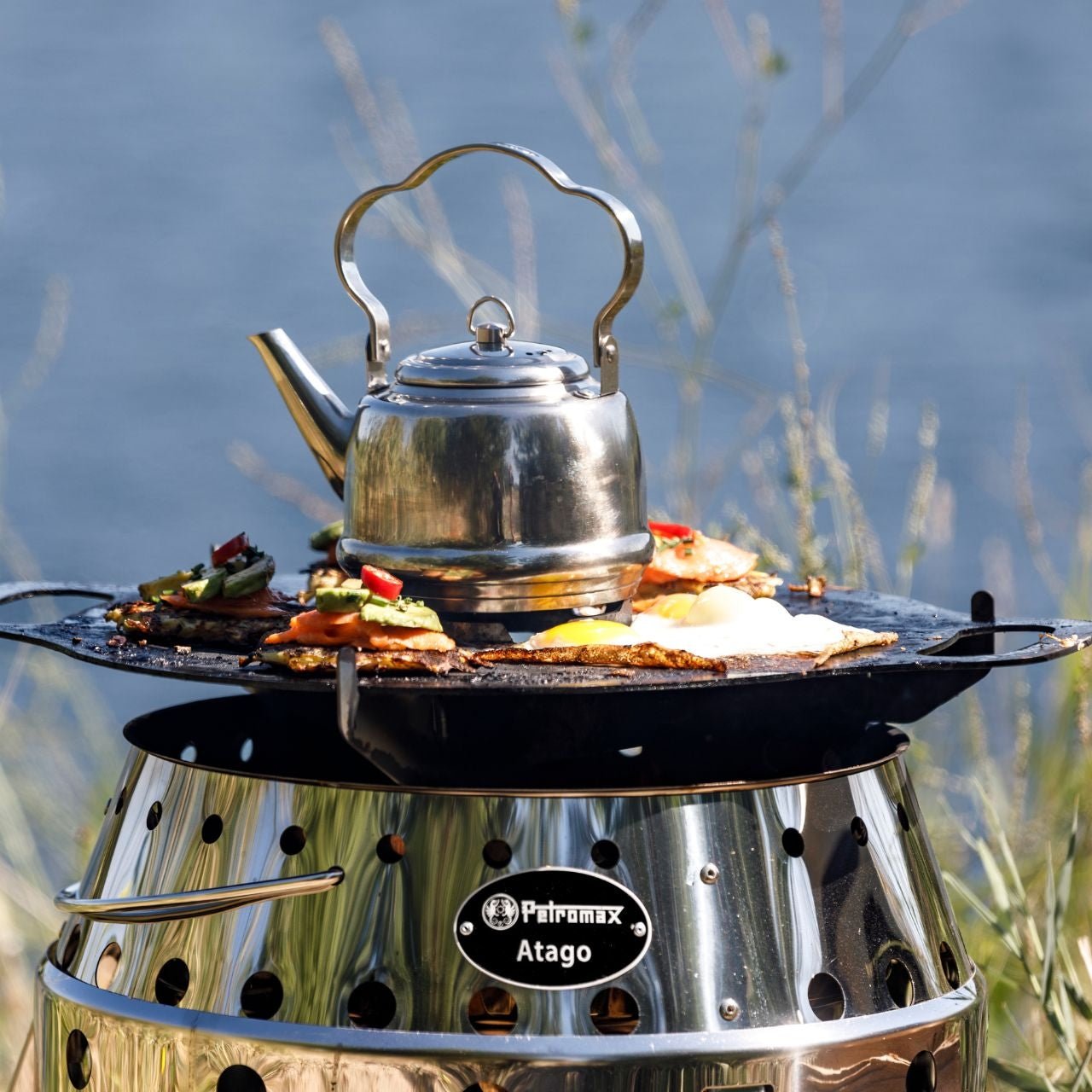 Petromax Kochaufsatz für Atago Grillplatte - grillstarshop.comPetromax Kochaufsatz für Atago GrillplattePetromaxgrillstarshop.comptatago - plate - c4250435700303