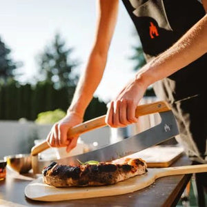 Solo Stove Pi Pizzaschneider Wiegemesser - grillstarshop.comSolo Stove Pi Pizzaschneider WiegemesserSolo Stovegrillstarshop.com